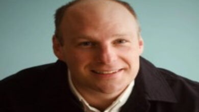 James Dacre